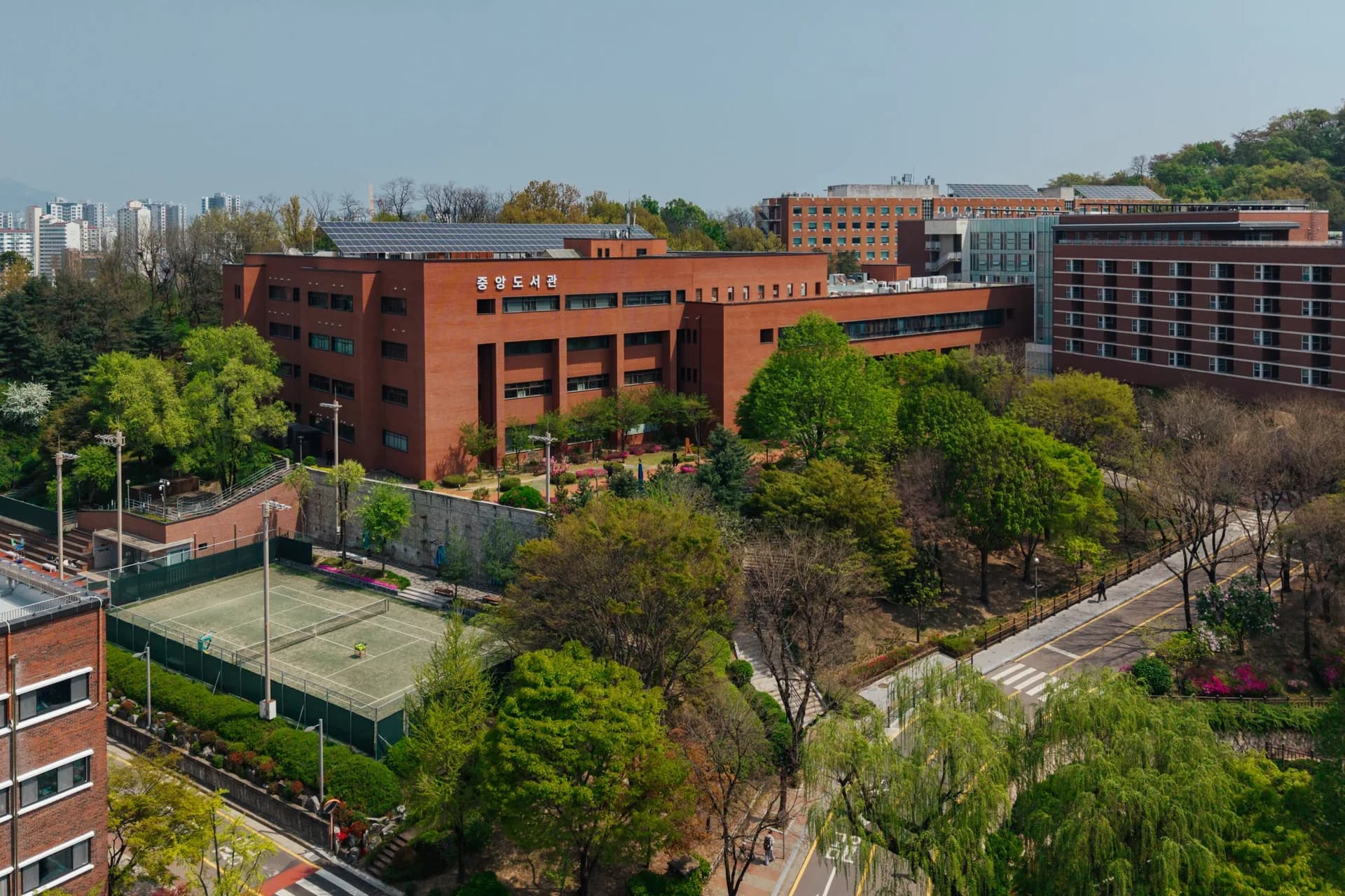 Elevated spring view of University of Seoul campus buildings